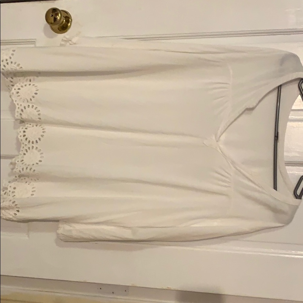 White eyelet top with cutout detailing